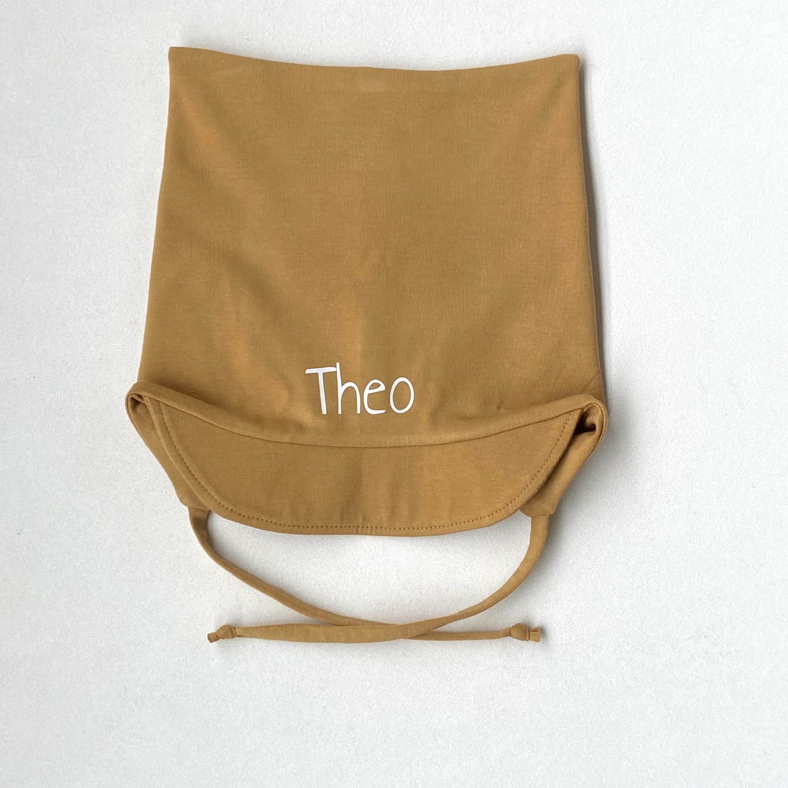 Lue med brem og navn, 0-4år